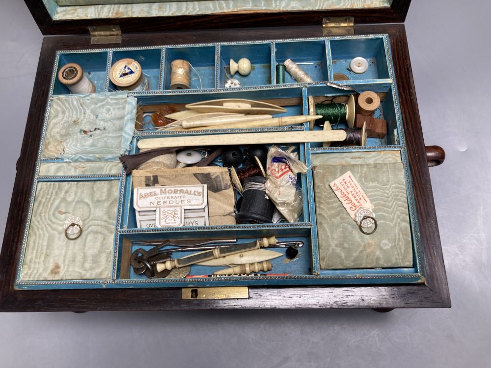 A Victorian mother of pearl-inlaid rosewood sewing box, containing various accessories, lace bobbins, etc.